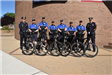 Bicycle Unit pose for a Group Photo with Bikes