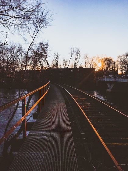 Abandoned Rails Bridge over a River