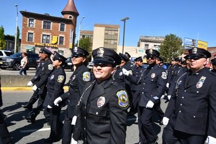 Officers March in the Street for the Memorial Day Parade